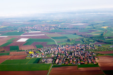 Village - view on the edge of agricultural fields and farmland in Oberpleichfeld in the state Bavaria, Germany