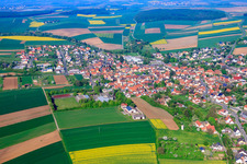 Village between fields from the east in Schwanfeld in the state Bavaria, Germany