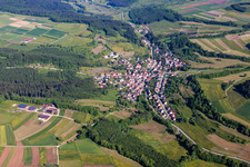 Village - view on the edge of agricultural fields and farmland in Zimmern unter der Burg in the state Baden-Wurttemberg, Germany