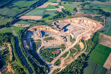 Aerial view of Site and Terrain of overburden surfaces Cement opencast mining Steinbruch Walzbachtal in Walzbachtal in the state Baden-Wurttemberg, Germany