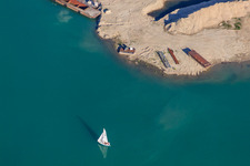 Sailboat in Lake Epplesee in the district Silberstreifen in Rheinstetten in the state Baden-Wuerttemberg, Germany