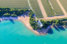 Aerial photograpy of Nudist beach Epplesee crowded with bathers in the district Forchheim in Rheinstetten in the state Baden-Wuerttemberg, Germany