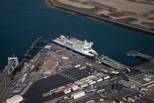 Aerial view of Ferry at the Port on the seashore of the Channel-ferry port Dunkerque in Loon-Plage in Hauts-de-France, France