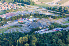 Aerial view of Lorries and Truck storage areas and free-standing storage on former customs Lauterbourg now state-police department Bienwald in Scheibenhard in Grand Est, France