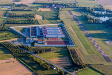 Aerial view of Prison grounds and high security fence Prison Justizvollzugsanstalt Offenburg on Flugplatz Offenburg-Baden in Offenburg in the state Baden-Wurttemberg, Germany