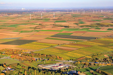 Geothermal power plant in front of wind farm in Insheim in the state Rhineland-Palatinate, Germany