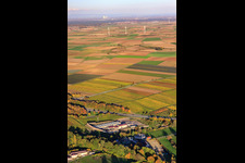 Oblique view of Geothermal power plant in front of wind farm in Insheim in the state Rhineland-Palatinate, Germany