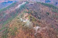 Aerial view of Madenburg castle ruins under clouds of fog in Eschbach in the state Rhineland-Palatinate, Germany
