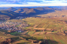 Aerial photograpy of Wine village in winter between bare vineyards from the southeast in Klingenmünster in the state Rhineland-Palatinate, Germany