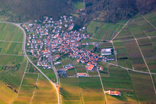 Wine-growing village in winter between bare vineyards from the east in Eschbach in the state Rhineland-Palatinate, Germany