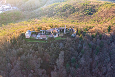 Aerial photograpy of Madenburg, Remains of an 11th-century hilltop castle surrounded by forests with a restaurant from the west in Eschbach in the state Rhineland-Palatinate, Germany