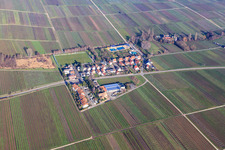 Loeonard-Eckel-Siedlung with sports field of the Südhaardter Sportverein 2023 eV and outdoor swimming pool Edesheim in Edesheim in the state Rhineland-Palatinate, Germany