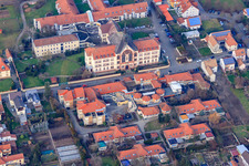 Aerial view of St. Paulus Stift Herxheim and Caritas Support Center St. Laurentius and Paulus in Herxheim bei Landau in the state Rhineland-Palatinate, Germany