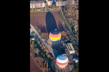 French German painted gas storage tanks in Rastatt in the state Baden-Wuerttemberg, Germany out of the air