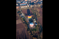French German painted gas storage tanks in Rastatt in the state Baden-Wuerttemberg, Germany seen from above