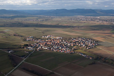 Aerial view of Village - view on the edge of agricultural fields and farmland in Impflingen in the state Rhineland-Palatinate, Germany