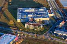 Aerial view of DBK EMS GmbH & Co. KG in the Nordring industrial park in Rülzheim in the state Rhineland-Palatinate, Germany