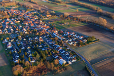 Oblique view of Village view in winter from the west in Herxheimweyher in the state Rhineland-Palatinate, Germany
