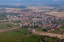 Aerial photograpy of Village - view on the edge of agricultural fields and farmland in Surbourg in Grand Est, France