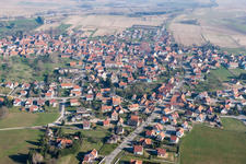 Oblique view of Village - view on the edge of agricultural fields and farmland in Surbourg in Grand Est, France