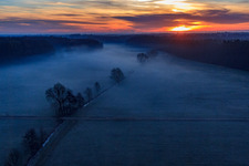 Aerial photograpy of Otterbach lowlands in the morning mist at sunrise in Minfeld in the state Rhineland-Palatinate, Germany