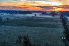 Otterbach lowlands in the morning mist at sunrise in Minfeld in the state Rhineland-Palatinate, Germany out of the air