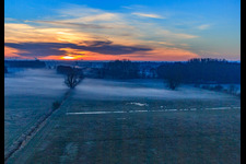 Otterbach lowlands in the morning mist at sunrise in Minfeld in the state Rhineland-Palatinate, Germany from the plane