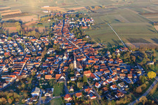 Catholic Church of St. Laurentius and Laurentius Garden in Pfaffengasse in the morning from the east in Göcklingen in the state Rhineland-Palatinate, Germany