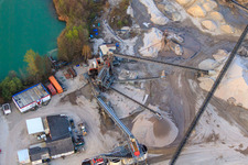 Oblique view of At the gravel works with Holcim Kies und Beton GmbH in Rheinzabern in the state Rhineland-Palatinate, Germany
