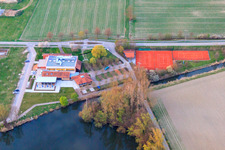Hugo-Dörrler-Halle and tennis court of the TC 1983 eV Leimersheim at the pumping station Leimersheim in Leimersheim in the state Rhineland-Palatinate, Germany