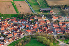 Burggut Castle Höchheim and St. Michael's Church in Höchheim in the state Bavaria, Germany