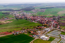 Village - view on the edge of agricultural fields and farmland in Straufhain in the state Thuringia, Germany