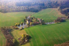 Buildings and castle park - facilities of the moated castle Brennhausen in the district Brennhausen in Sulzdorf an der Lederhecke in the state Bavaria, Germany