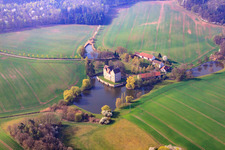 Aerial view of Buildings and castle park - facilities of the moated castle Brennhausen in the district Brennhausen in Sulzdorf an der Lederhecke in the state Bavaria, Germany