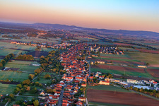 Oblique view of Village view in the morning from the east in Freckenfeld in the state Rhineland-Palatinate, Germany
