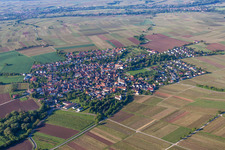 Aerial view of Village - view on the edge of agricultural fields and farmland in Wollmesheim in the state Rhineland-Palatinate, Germany