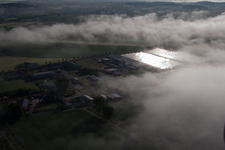 Weather-related panel rows of the photovoltaic plant of the solar park or solar power plant in the district Bredenborn in Marienmuenster in the state North Rhine-Westphalia