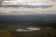 Panel rows of photovoltaic and solar farm or solar power plant in Beverungen in the state North Rhine-Westphalia