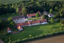 Aerial view of Farm on the edge of cultivated fields in the district Abbenburg in Brakel in the state North Rhine-Westphalia