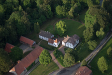 Aerial photograpy of Farm on the edge of cultivated fields in the district Abbenburg in Brakel in the state North Rhine-Westphalia