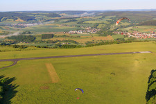 Parachute field at the Höxter-Holzminden airfield (EDVI) in the district Albaxen in Höxter in the state North Rhine-Westphalia, Germany seen from above