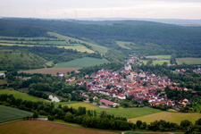Village - view on the edge of agricultural fields and farmland in Eussenheim in the state Bavaria