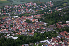 Town View of the streets and houses of the residential areas in Arnstein in the state Bavaria out of the air