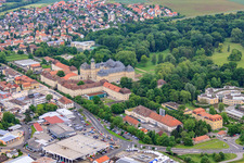 Castle park and castle Werneck with castle church and Albert Schweitzer House in Werneck in the state Bavaria, Germany