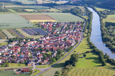 Oblique view of Village on the river bank areas of the Main river in the district Hirschfeld in Roethlein in the state Bavaria, Germany