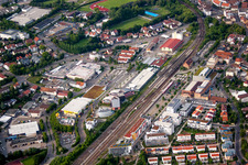 Aerial view of Station building and track systems of the S-Bahn station Herrenberg with UDG Herrenberg GmbH in Herrenberg in the state Baden-Wurttemberg, Germany