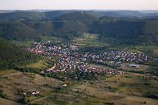 Aerial view of Village - view on the edge of agricultural fields and farmland in Reutlingen in the state Baden-Wurttemberg, Germany