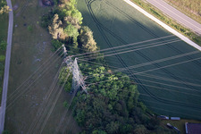 Tangle of high-voltage lines in the district Schmiechen in Schelklingen in the state Baden-Wuerttemberg, Germany