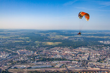 Paragliding over the city in the district Weststadt in Ulm in the state Baden-Wuerttemberg, Germany