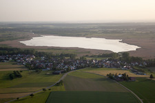 Village in front of the Federsee with pile dwellings in Tiefenbach in the state Baden-Wuerttemberg, Germany